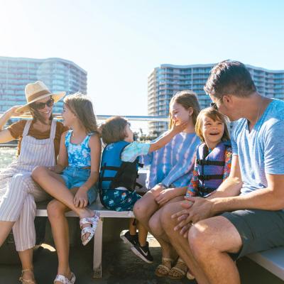 family onboard a dolphin cruise with Fun Boat Tours in Orange Beach