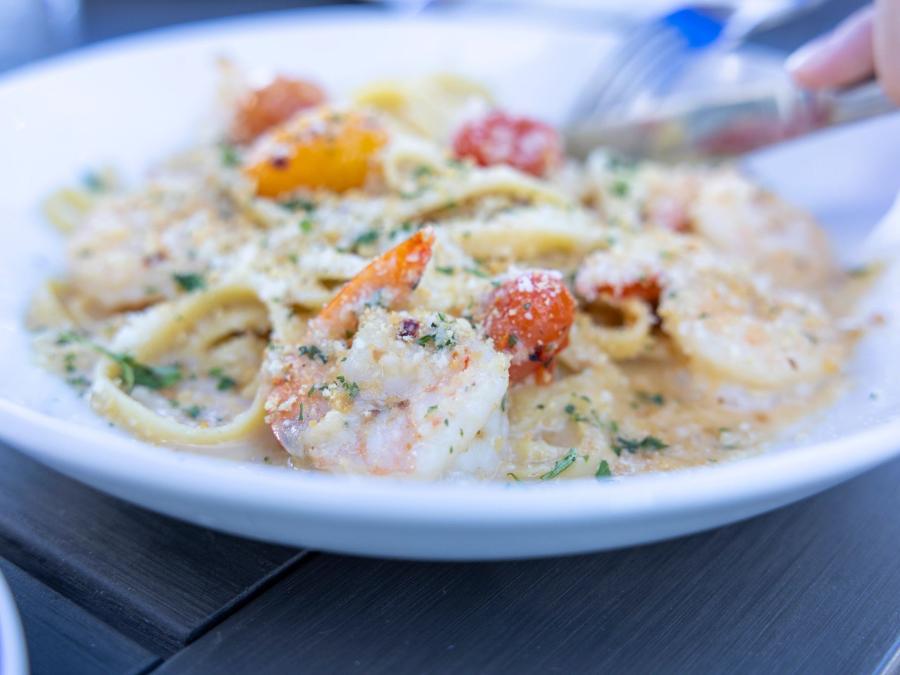 Plate of shrimp pasta at Zeke's Restaurant in Orange Beach